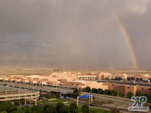 cd130-d54.jpg - Rain shower and rainbow